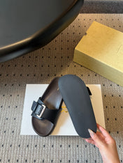 THE ROW 26S BUCKLE SLIDE SANDALS IN BLACK CALFSKIN