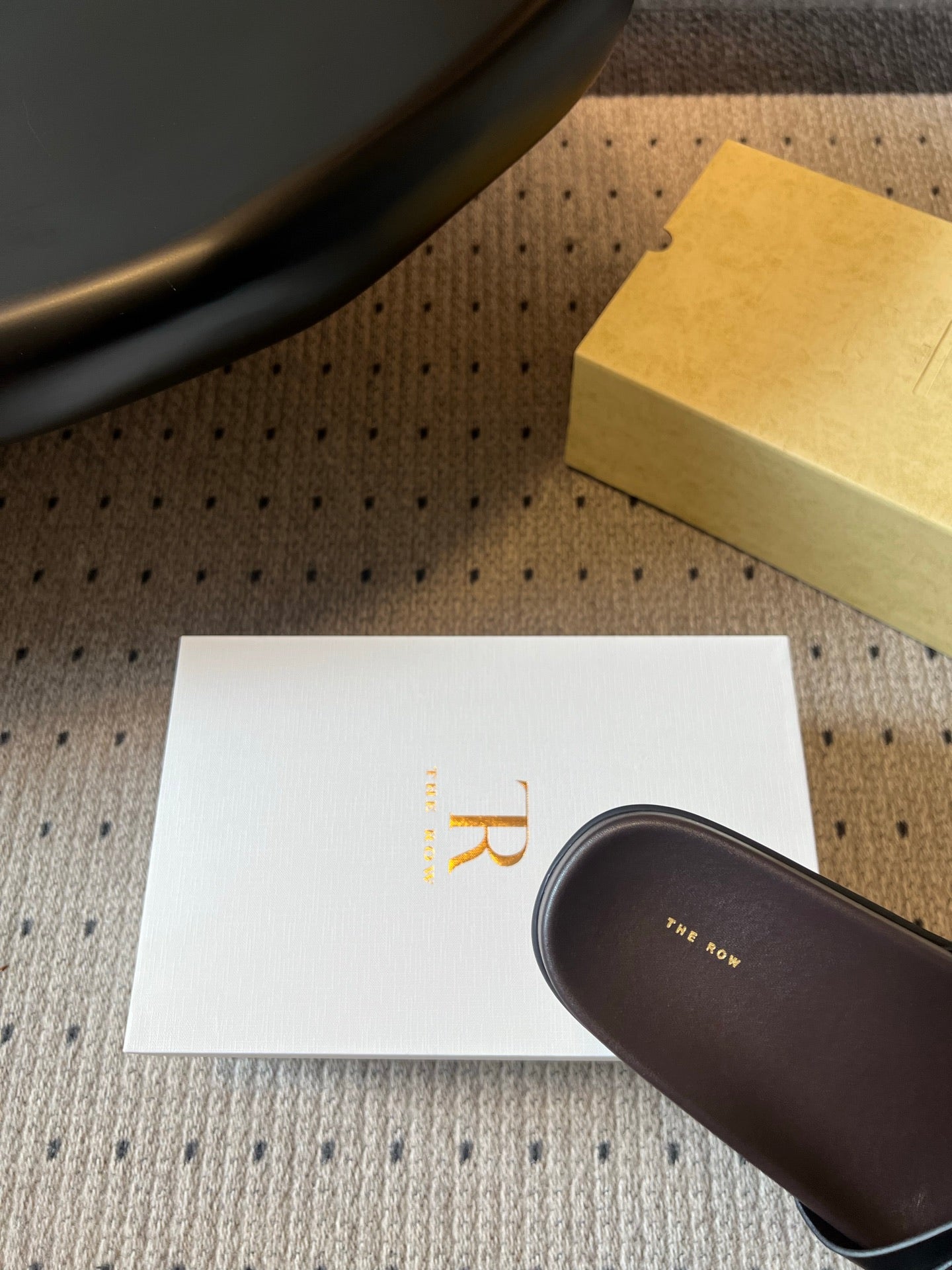 THE ROW 26S BUCKLE SLIDE SANDALS IN BLACK CALFSKIN