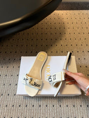 DIOR 26S DWAY SLIDE IN WHITE FABRIC AND LAMBSKIN