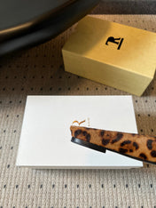 THE ROW 26S SQUARE TOE BACKLESS SLIDES IN BROWN SPOTTED CALF HAIR