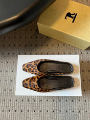 THE ROW 26S SQUARE TOE BACKLESS SLIDES IN BROWN SPOTTED CALF HAIR