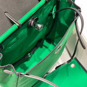 HERBAG A DOS ZIP RETOURNE BACKPACK 29 IN GREEN CANVAS AND BLACK CALFSKIN