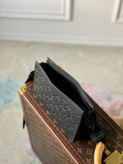 POCHETTE VOYAGE 22 IN BLACK MONOGRAM SHADOW CALFSKIN