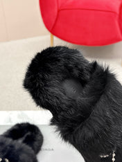 BALENCIAGA 25S SOFT FUR SLIPPERS IN BLACK FUR WITH RHINESTONE BOW