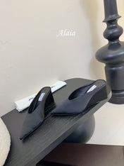 ALAIA HIGH MULES 25S IN BLACK SATIN