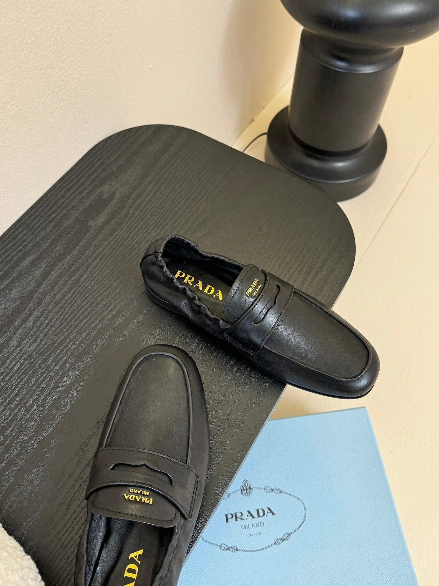 PRADA 25S SHUFFLE LOAFERS IN BLACK CALFSKIN