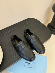 PRADA 25S SHUFFLE LOAFERS IN BLACK CALFSKIN