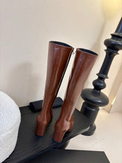 YSL 26S KNEE-HIGH HEELED BOOTS IN BROWN SHINY CALFSKIN