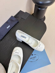 PRADA 26S BLOCK-HEEL MARY JANE IN WHITE PATENT CALFSKIN
