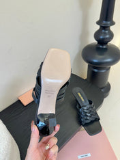 MIUMIU 26S IVETTE WOVEN HEELED SANDALS 40MM IN BLACK CALFSKIN