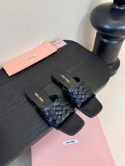 MIUMIU 26S IVETTE WOVEN SLIDE SANDALS IN BLACK CALFSKIN