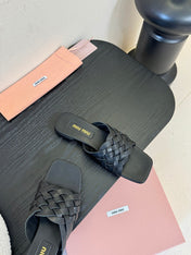 MIUMIU 26S IVETTE WOVEN SLIDE SANDALS IN BLACK CALFSKIN