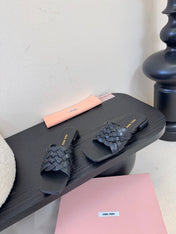 MIUMIU 26S IVETTE WOVEN SLIDE SANDALS IN BLACK CALFSKIN