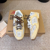 MIUMIU 26S PERFORATED SNEAKERS IN WHITE AND BEIGE YELLOW CALFSKIN
