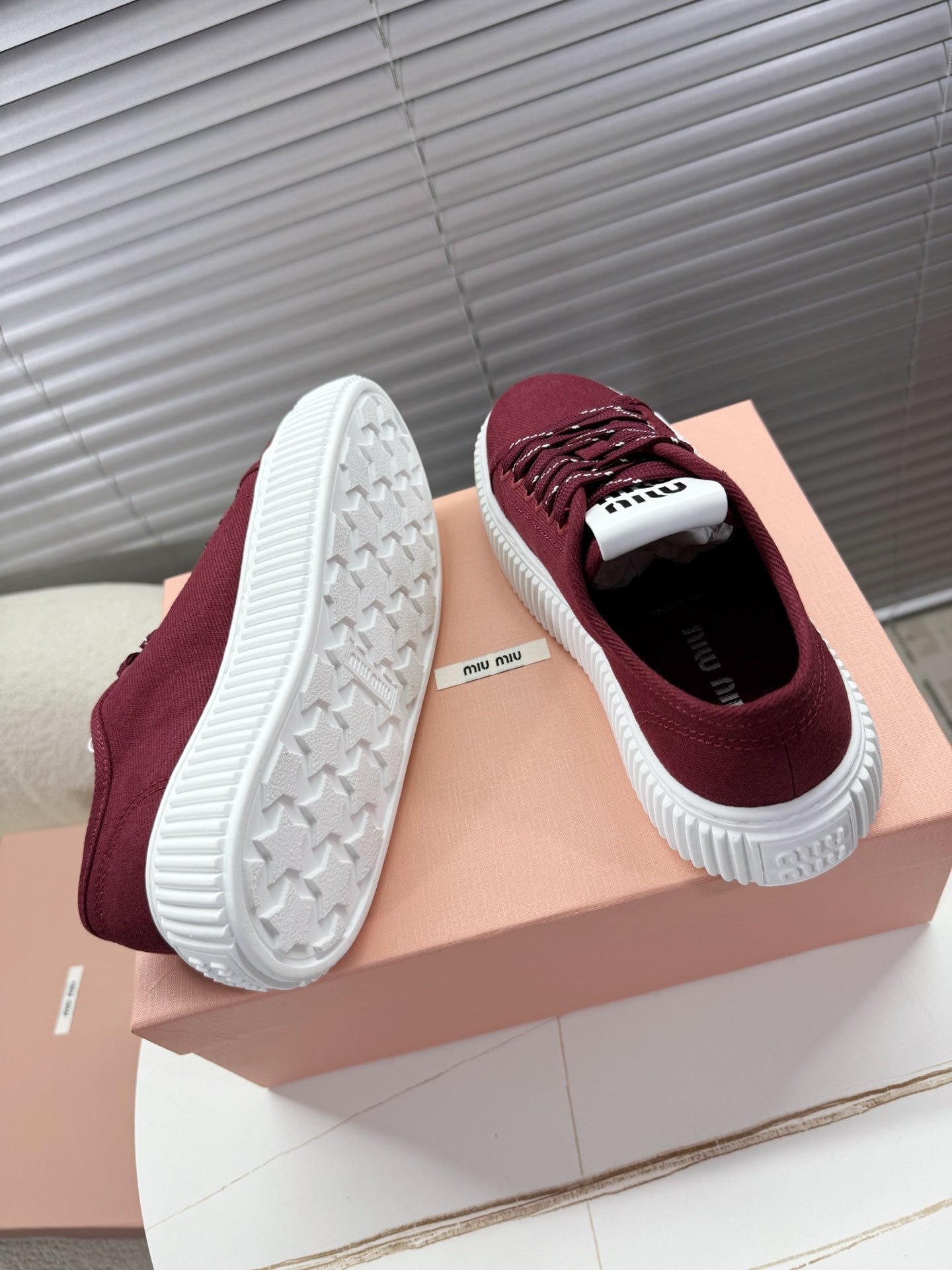 MIUMIU 26S PLATFORM SNEAKERS IN DARK RED CANVAS