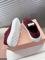 MIUMIU 26S PLATFORM SNEAKERS IN DARK RED CANVAS