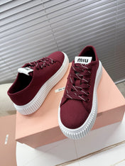 MIUMIU 26S PLATFORM SNEAKERS IN DARK RED CANVAS