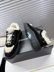 CHANEL 25S SNEAKERS WITH FUR ACCENTS 35MM IN BLACK CALFSKIN
