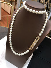 CHANEL 25S CHAIN BELT IN WHITE PEARL 615991