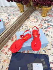 PRADA 26S THONG SANDALS IN RED CALFSKIN TRIANGLE LOGO