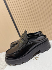 DIOR 25S BOY MULES IN BLACK CALFSKIN