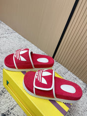 GUCCI 26S PLATFORM SLIDE SANDALS IN RED FABRIC