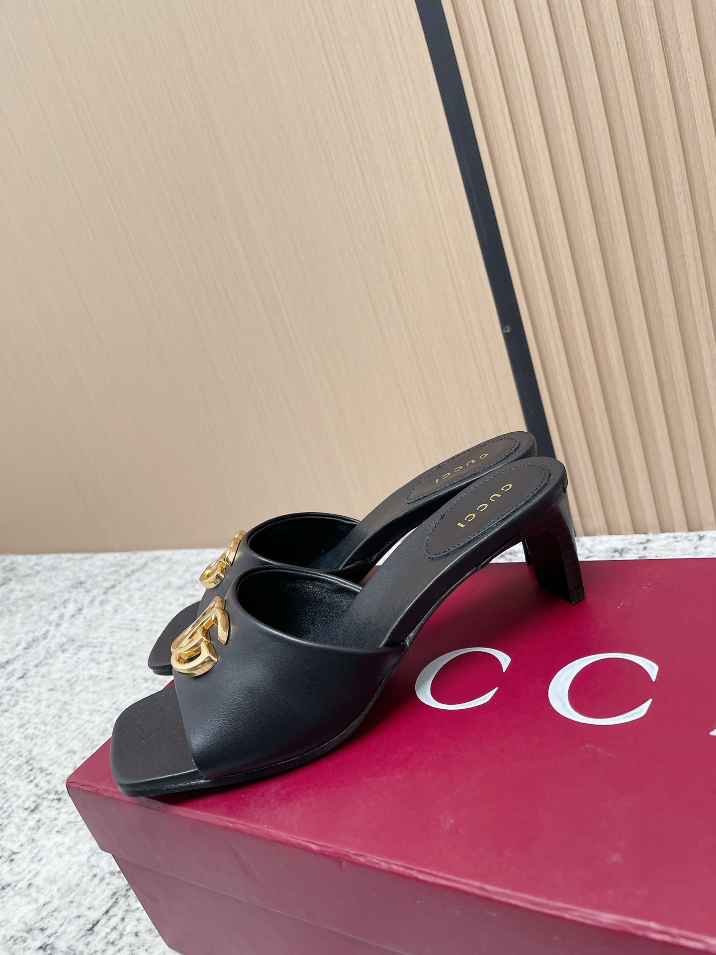 GUCCI 26S GG LOGO HIGH-HEEL MULES IN BLACK CALFSKIN