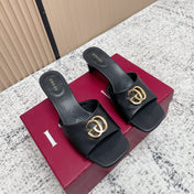GUCCI 26S GG LOGO HIGH-HEEL MULES IN BLACK CALFSKIN