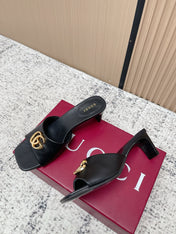 GUCCI 26S GG LOGO HIGH-HEEL MULES IN BLACK CALFSKIN