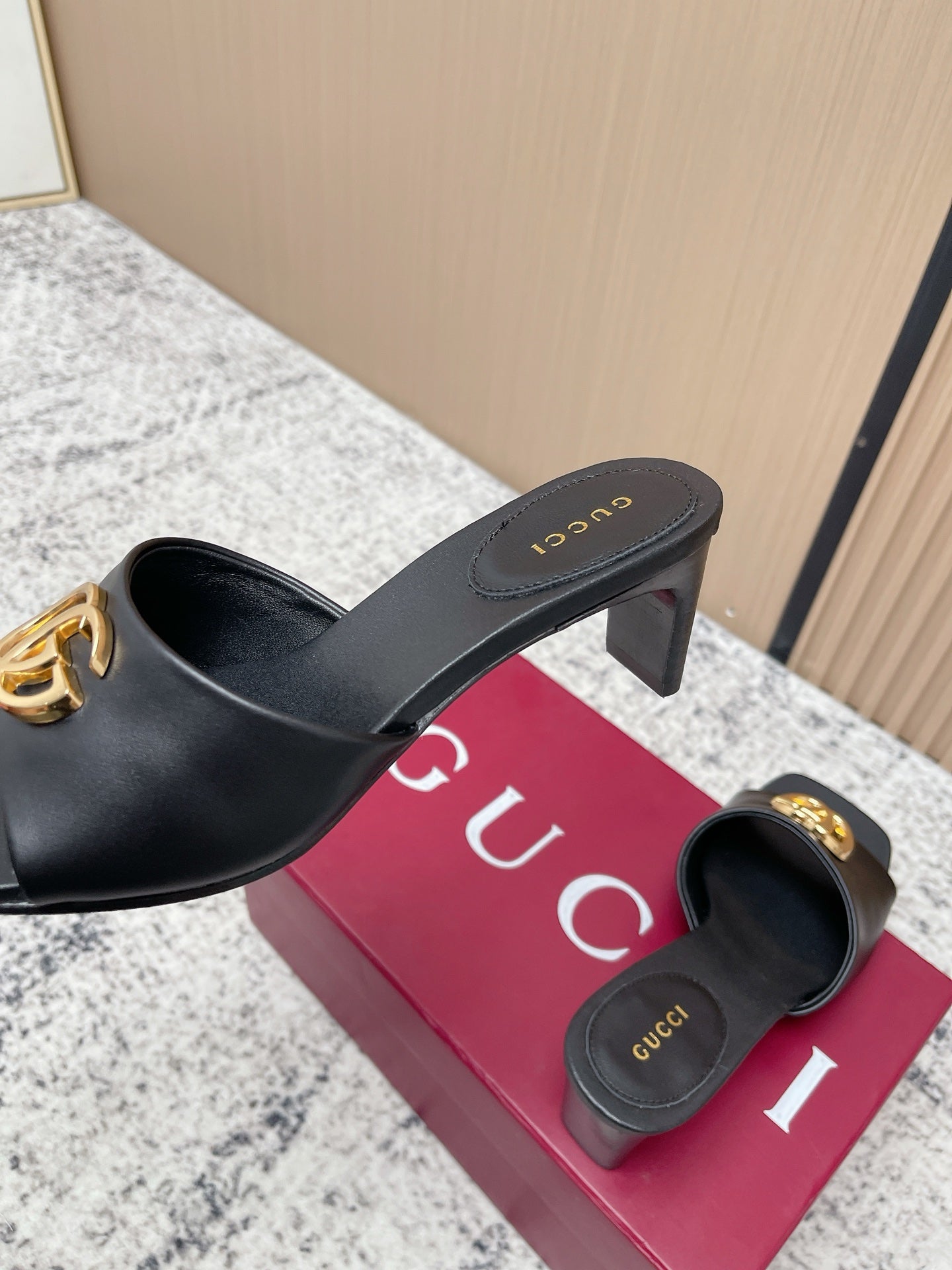 GUCCI 26S GG LOGO HIGH-HEEL MULES IN BLACK CALFSKIN