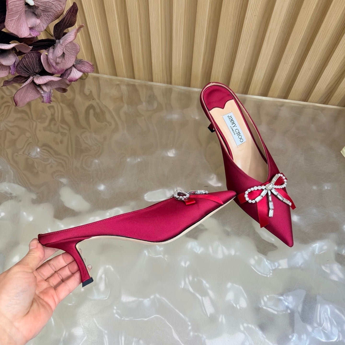 JIMMY CHOO 26S HIGH-HEELED MULES 65 MM IN RED SATIN WITH RHINESTONE BOW
