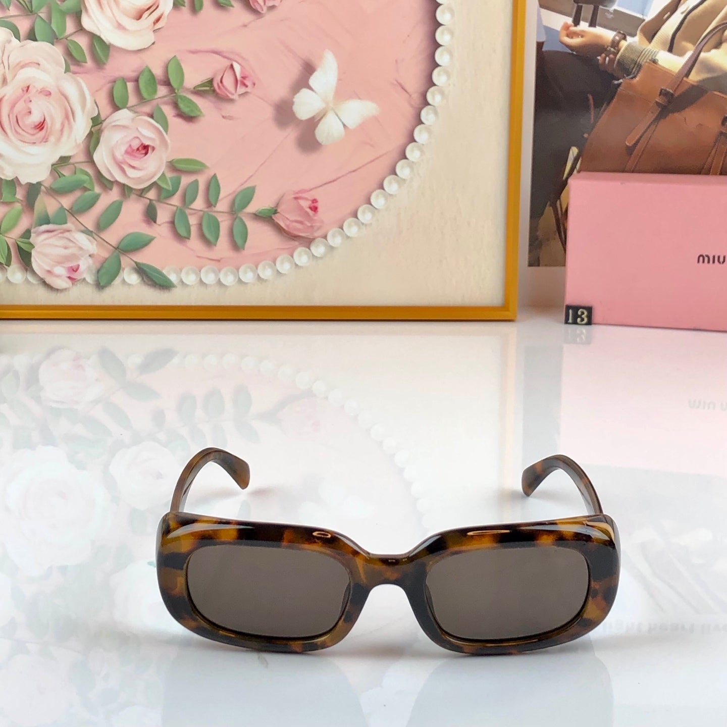 MIUMIU 26S RECTANGULAR FRAME IN ACETATE 420366