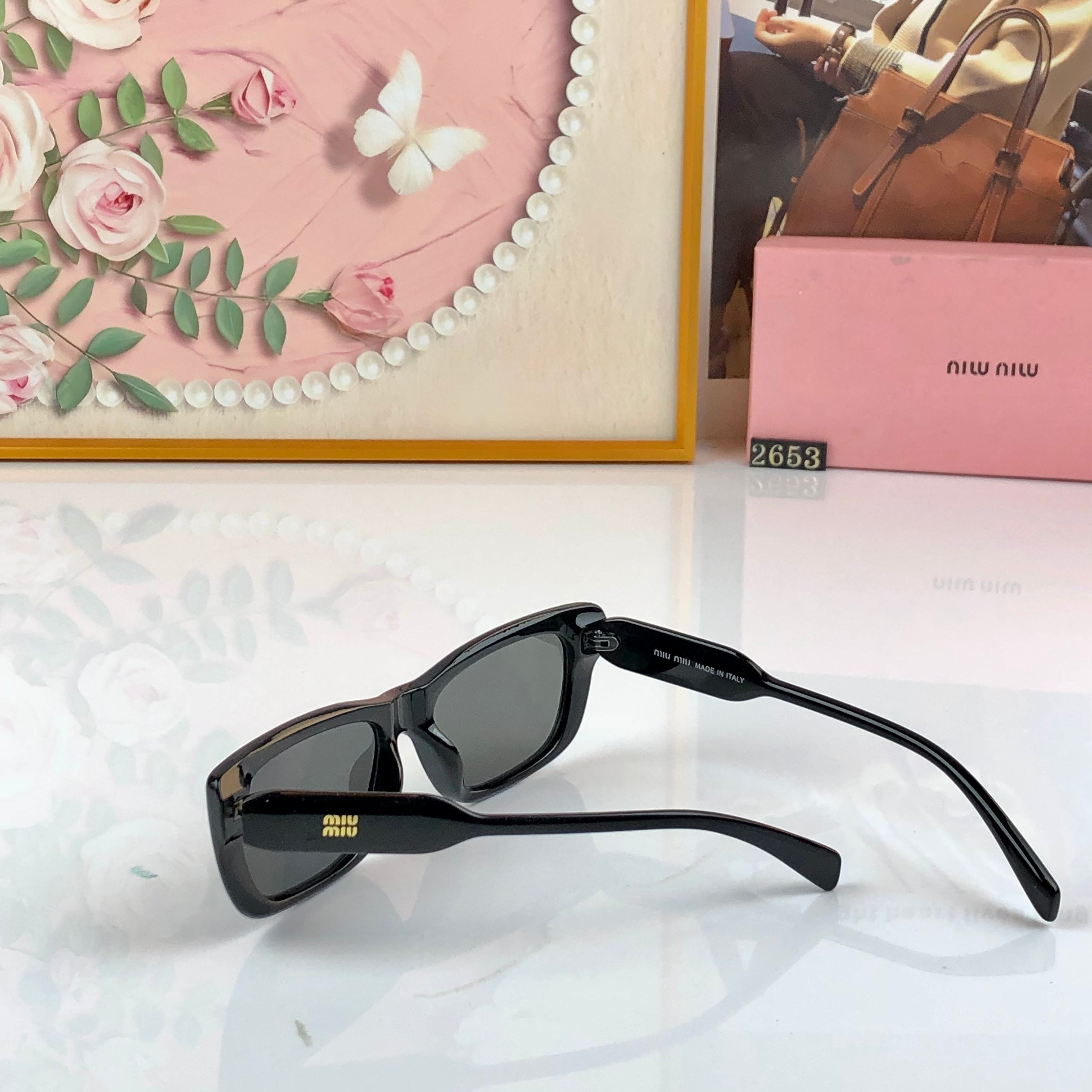 MIUMIU 26S RECTANGULAR FRAME IN ACETATE 408389