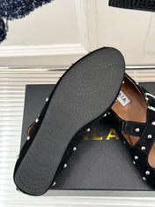 CROSSED STRAP BALLET FLATS IN BLACK SUEDE