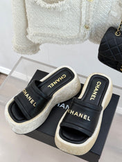 PLATFORM SLIPPERS IN BLACK LAMBSKIN
