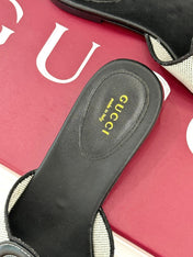 SLIDE SANDALS IN BLACK AND WHITE CALFSKIN