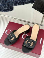 MID-HEEL MULE IN BLACK CALFSKIN
