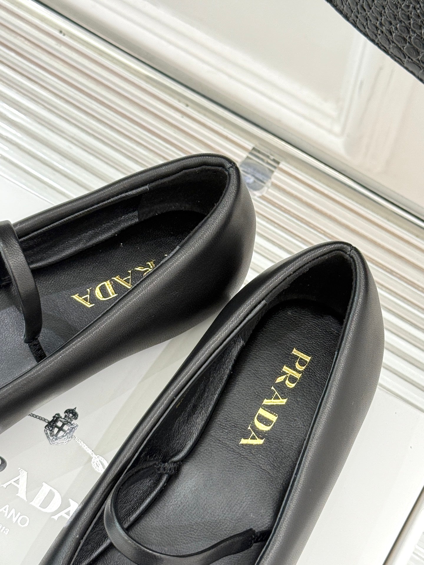 PRADA 25S SOFT PADDED BALLERINAS IN BLACK NAPPA LEATHER