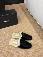PRADA 26S SHEARLING MULE SLIPPERS IN BLACK CALFSKIN
