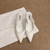 PRADA 26S SLINGBACK PUMPS IN WHITE PATENT CALFSKIN