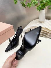 MIUMIU 26S SLINGBACK PUMPS 105MM IN BLACK CALFSKIN WITH BOW