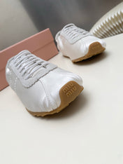 MIUMIU 26S SNEAKERS IN WHITE PLUME SATIN