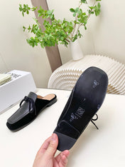 LOEWE 26S FLAT MULES IN BLACK CALFSKIN AND SUEDE