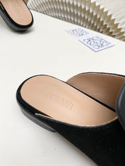 LOEWE 26S FLAT MULES IN BLACK CALFSKIN AND SUEDE