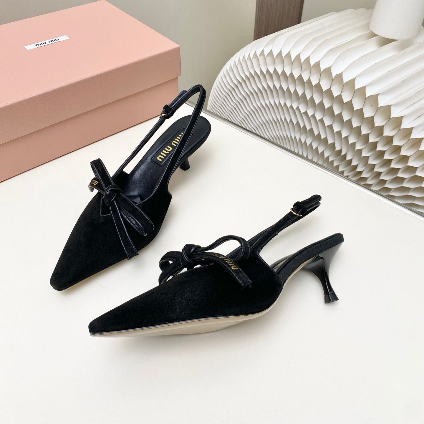 MIUMIU 26S SLINGBACK PUMPS 55MM IN BLACK SUEDE WITH BOW