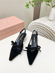 MIUMIU 26S SLINGBACK PUMPS 55MM IN BLACK SUEDE WITH BOW