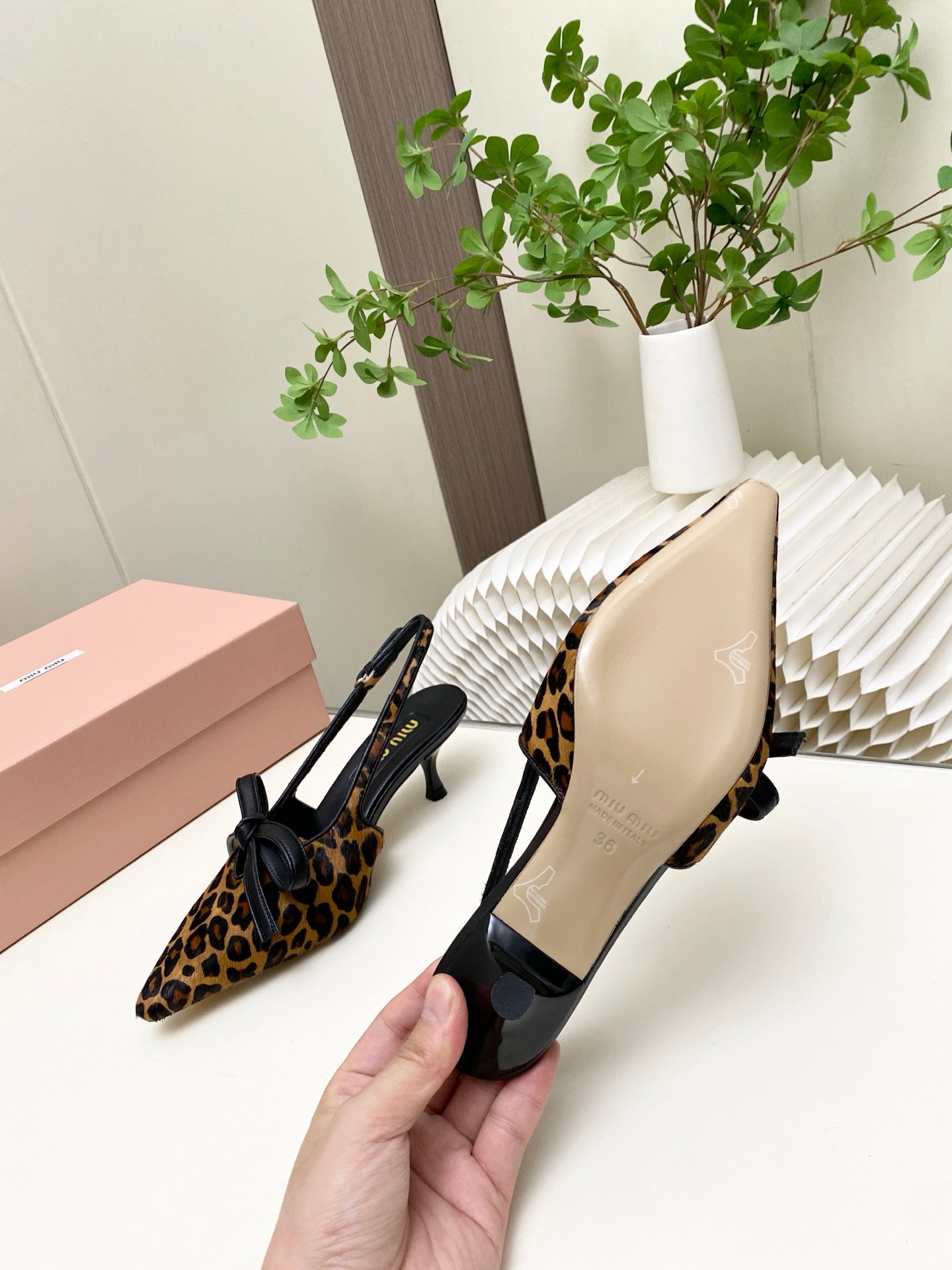 MIUMIU 26S SLINGBACK PUMPS 55MM IN LEOPARD PRINT CALF HAIR WITH BOW