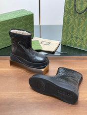 GG UGG BOOTS IN BLACK EMBOSSED SUEDE AND BEIGE WOOL LINING