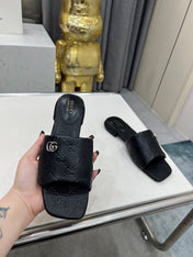 GG CASUAL SLIPPERS IN BLACK CALFSKIN LOGO EMBOSSING