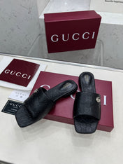 GG CASUAL SLIPPERS IN BLACK CALFSKIN LOGO EMBOSSING